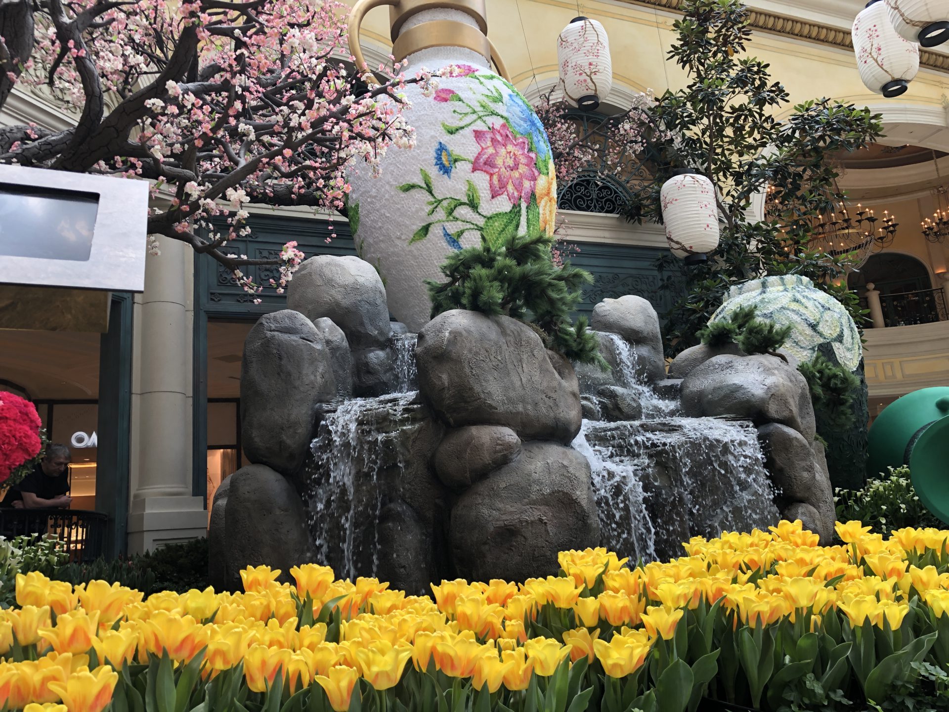 The Bellagio Conservatory displayed in lush botanical, vibrant floral arrangements, and intricate seasonal themes as one of the iconic Las Vegas Attractions