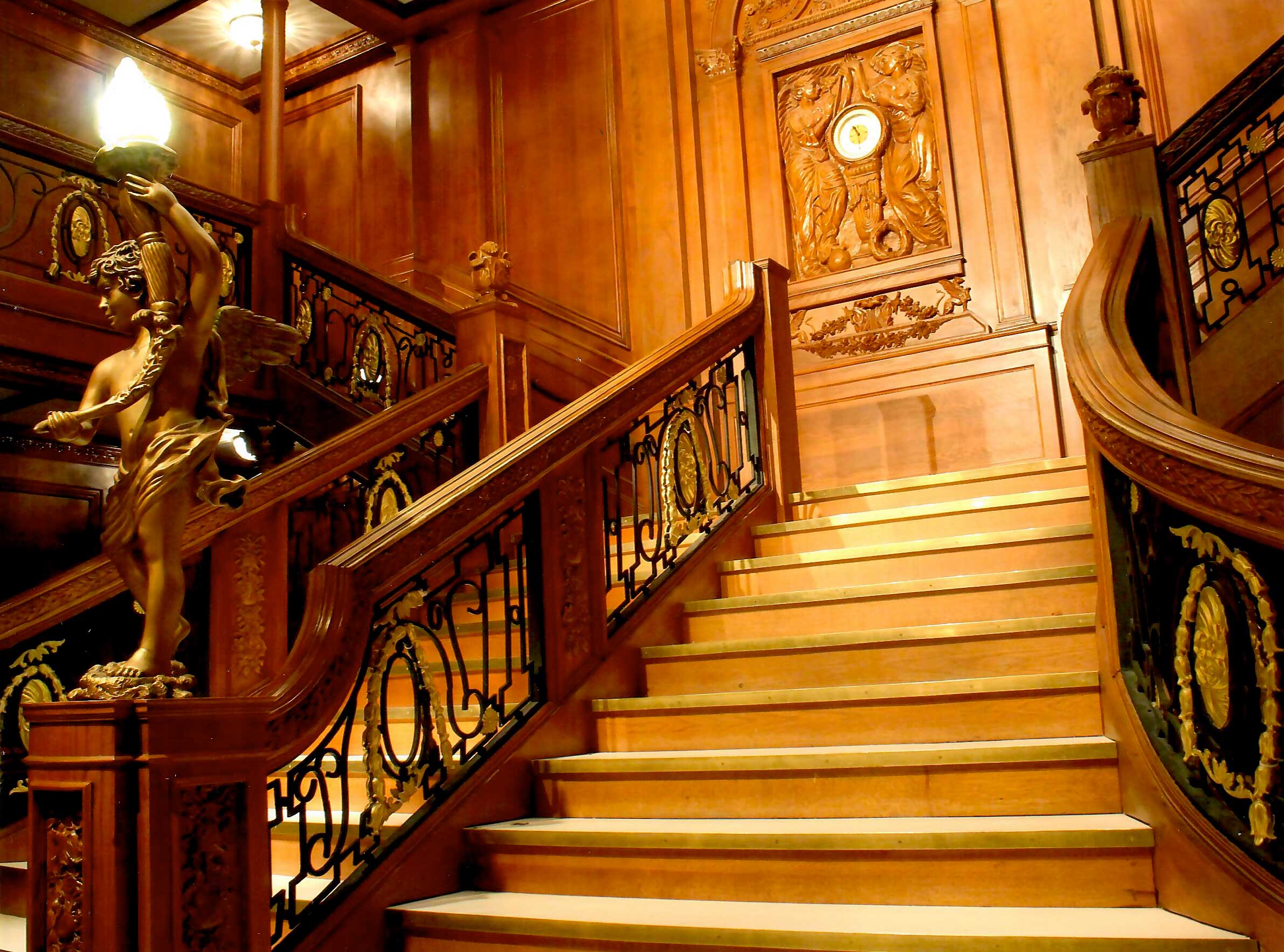 The Titanic Artifact Exhibition's stairway where it offers a solemn presentation of recovered artifacts from the ship, aiming to evoke the historical context of its tragic voyage.