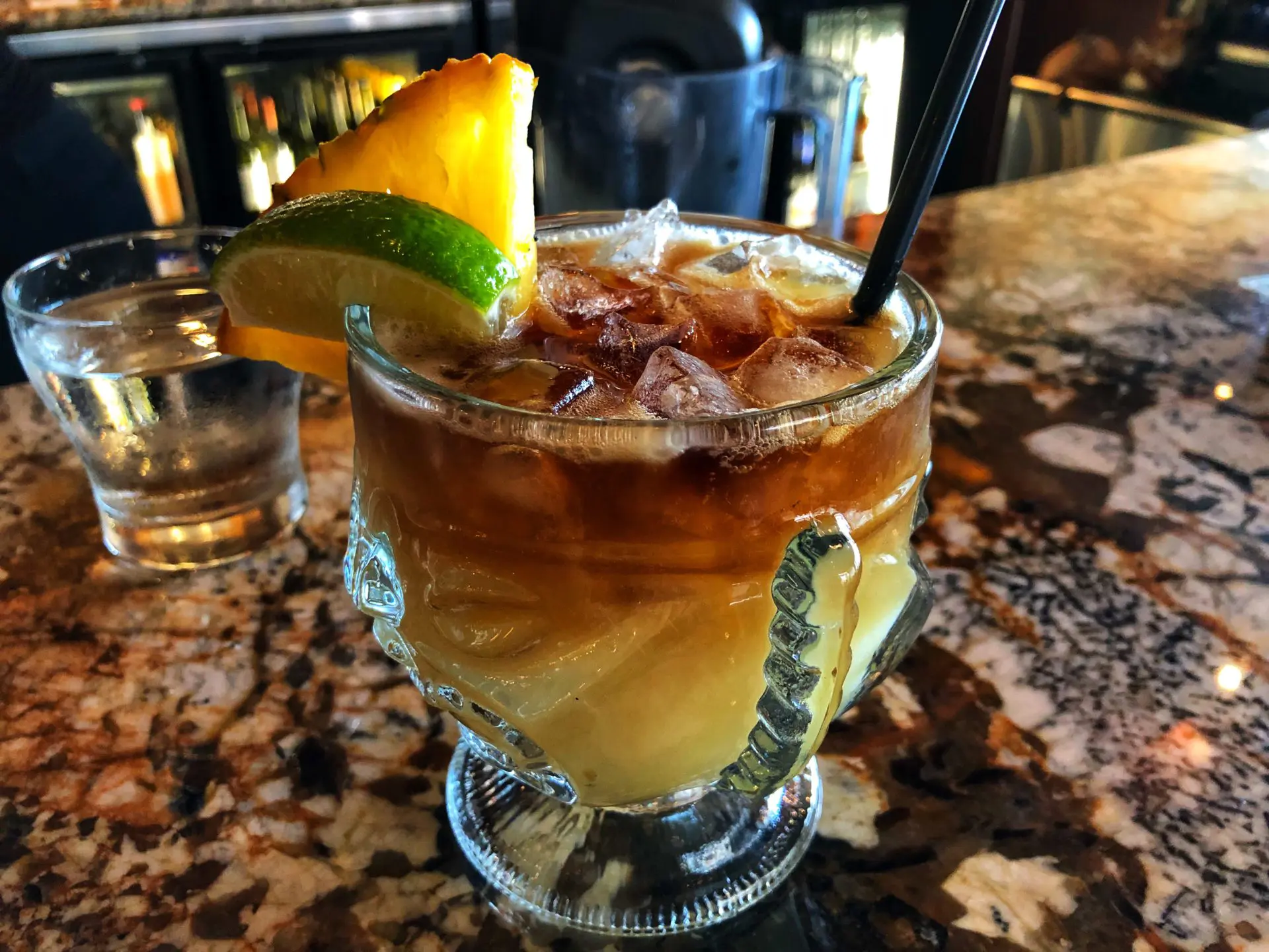 Mai Tai at Pita Paradise, Casual Mediterranean restaurant with a peaceful atmosphere, wooden decor, and a few outdoor seating options. 