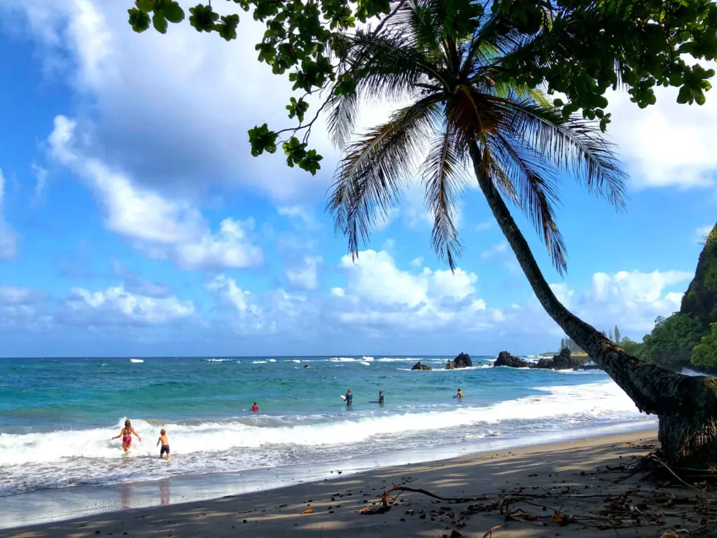 Hamoa Beach is just one of the numerous stops along the Road to Hana, providing a peaceful break during a day of traveling. 